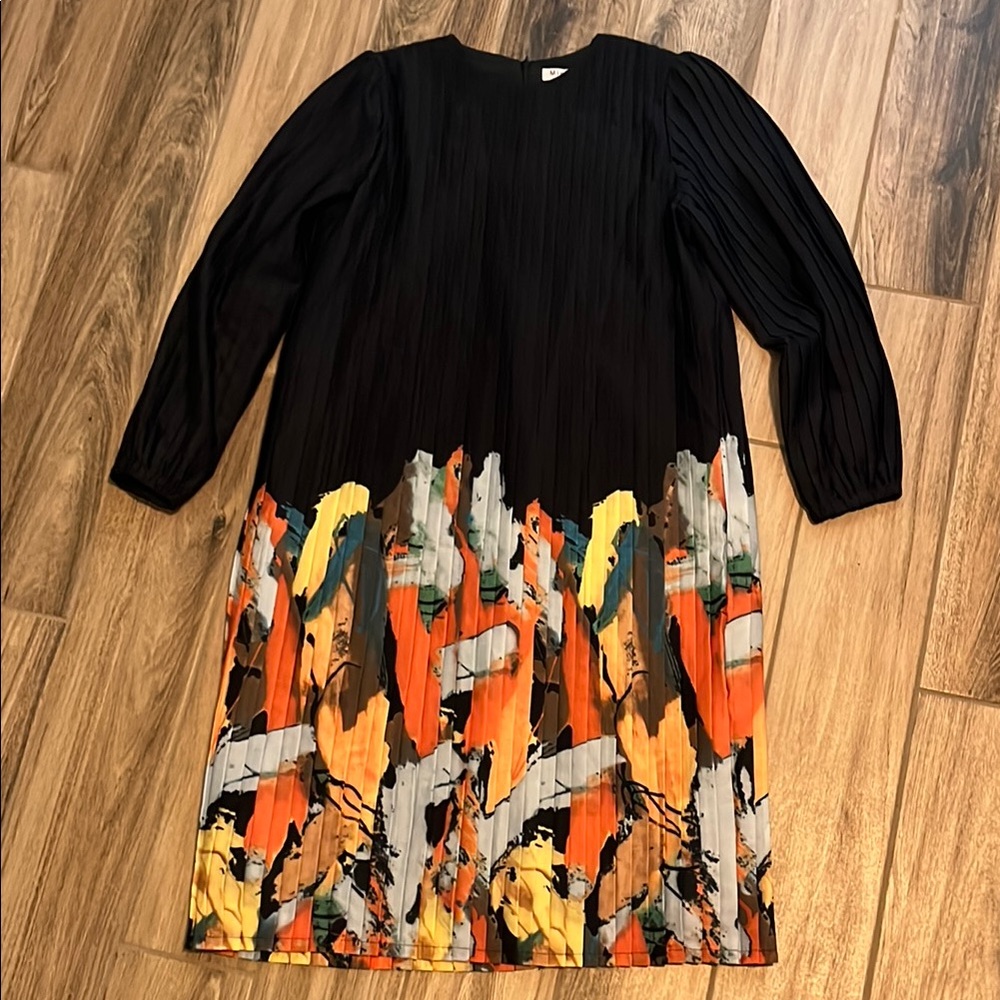 Minimal Black Pleated Dress with Vibrant Abstract Print